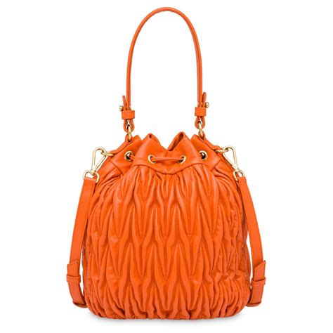 miu miu orange bag|farfetch miumiou bags.